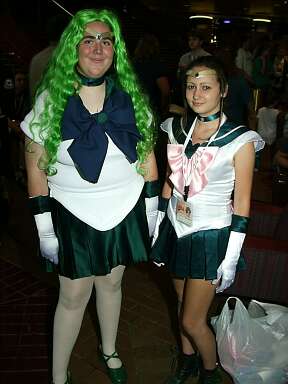 holy jesus, I nearly cried when I saw this. the Jupiter-costumed girl doesn't look too terrible, but that...thing...
